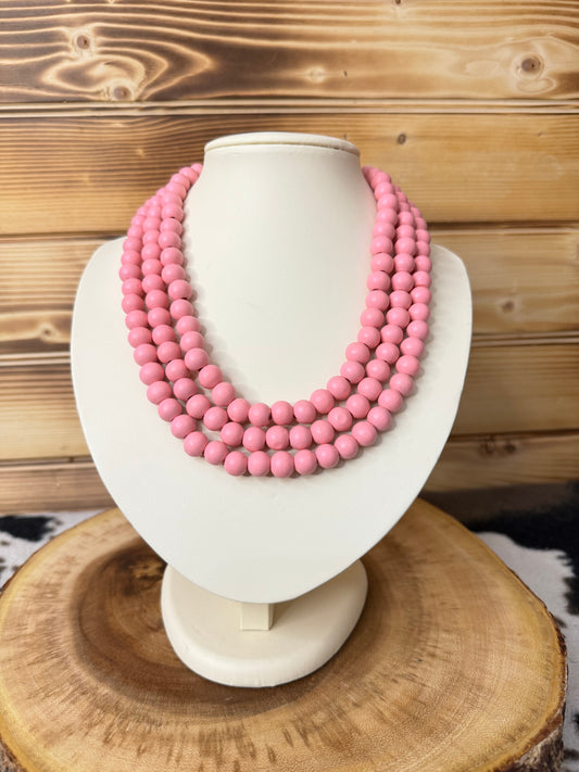 Triple Strand Pink Wood Bead Necklace